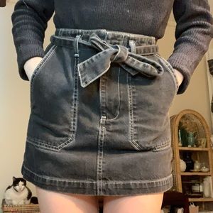 Black denim mini skirt